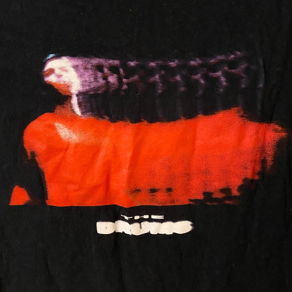 The drums band tee. Jonny pierce designed merch